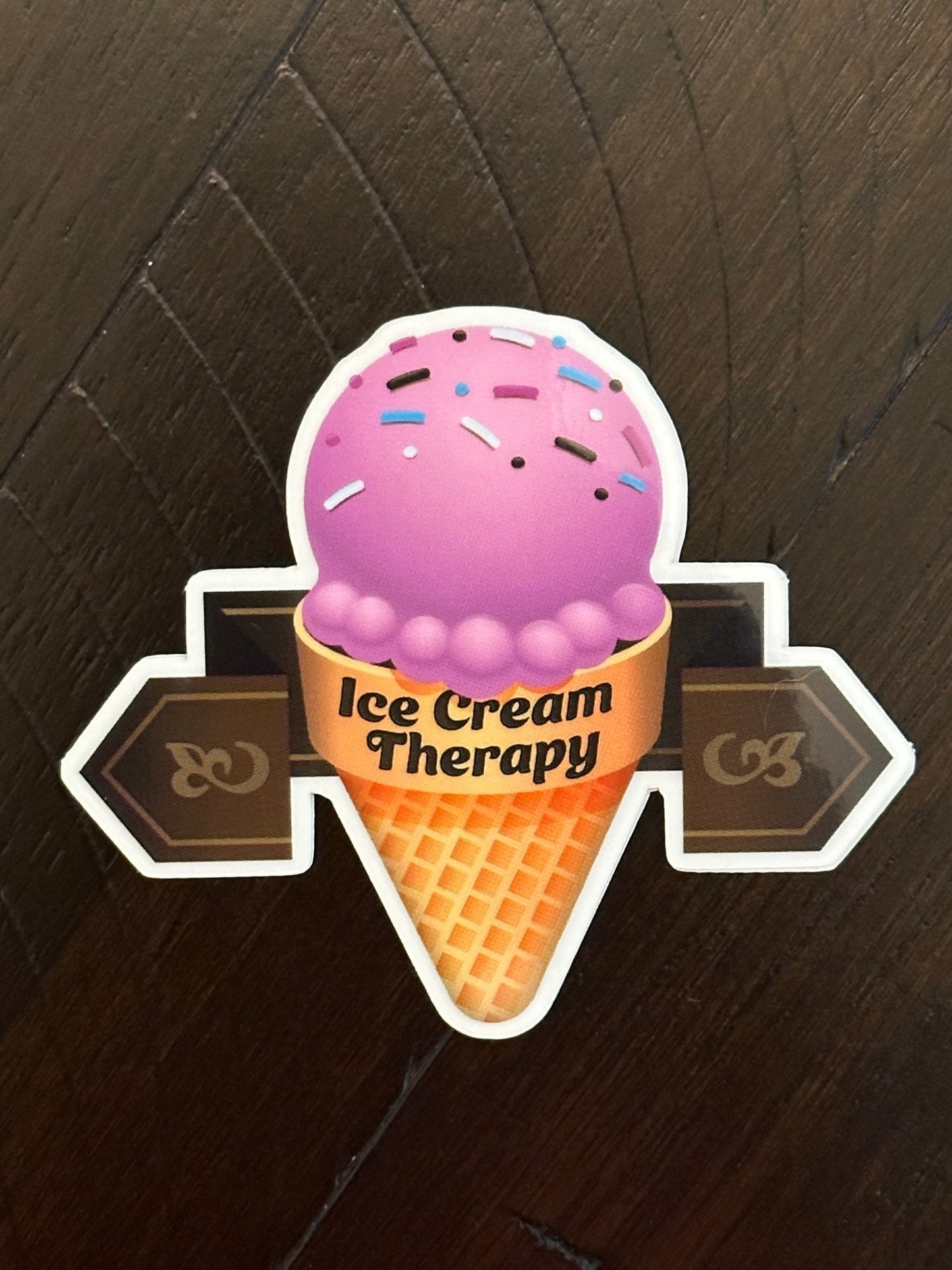 Ice Cream Therapy - Clear Sticker - 3 inches wide by 2.65 tall showing a strawberry sherbet with brown labels