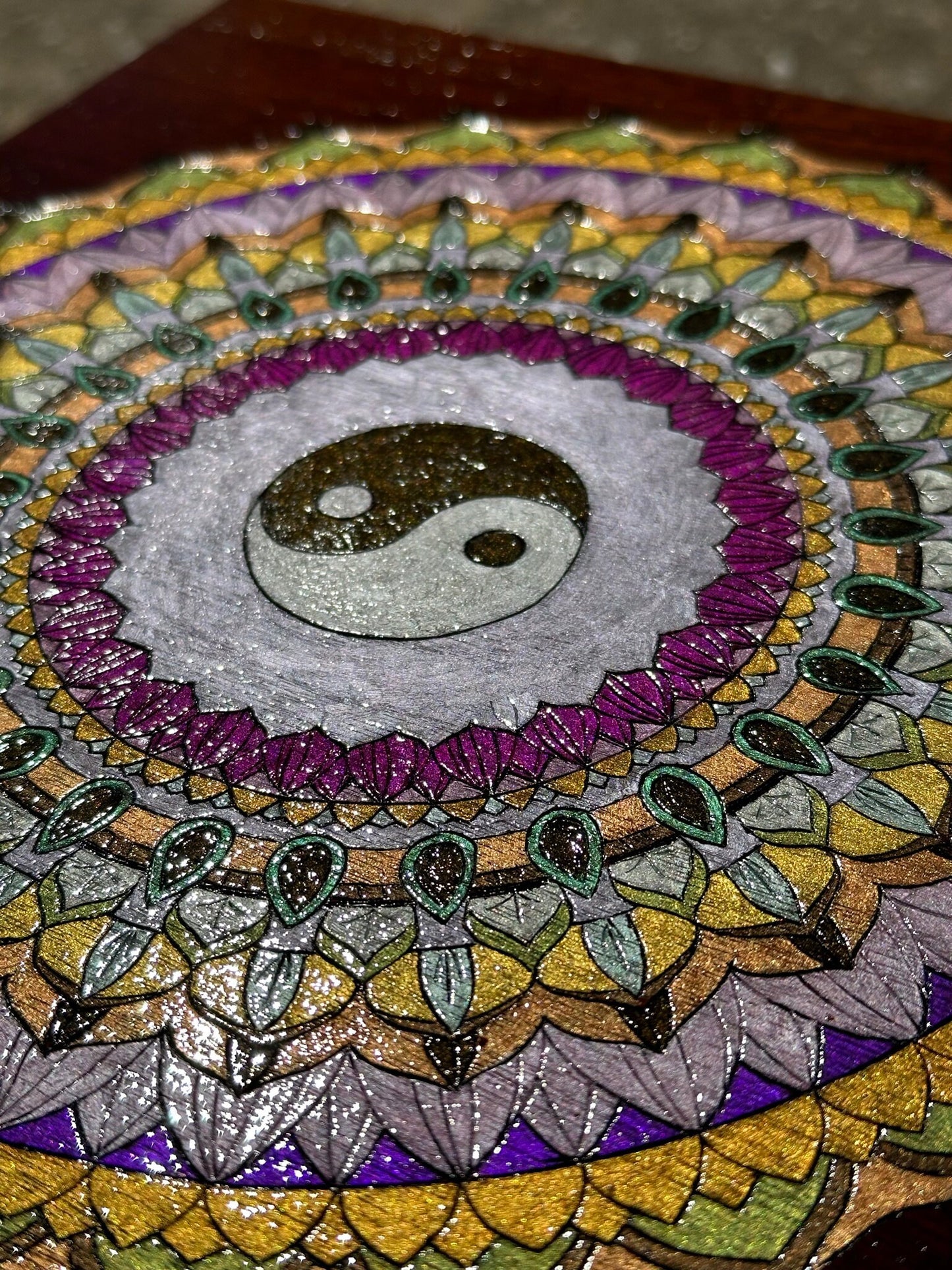 Ying Yang Mandala wood burned on reclaimed bar wood - deep reddish wood stained with a burned sienna colored stain