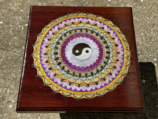 Ying Yang Mandala wood burned on reclaimed bar wood - deep reddish wood stained with a burned sienna colored stain