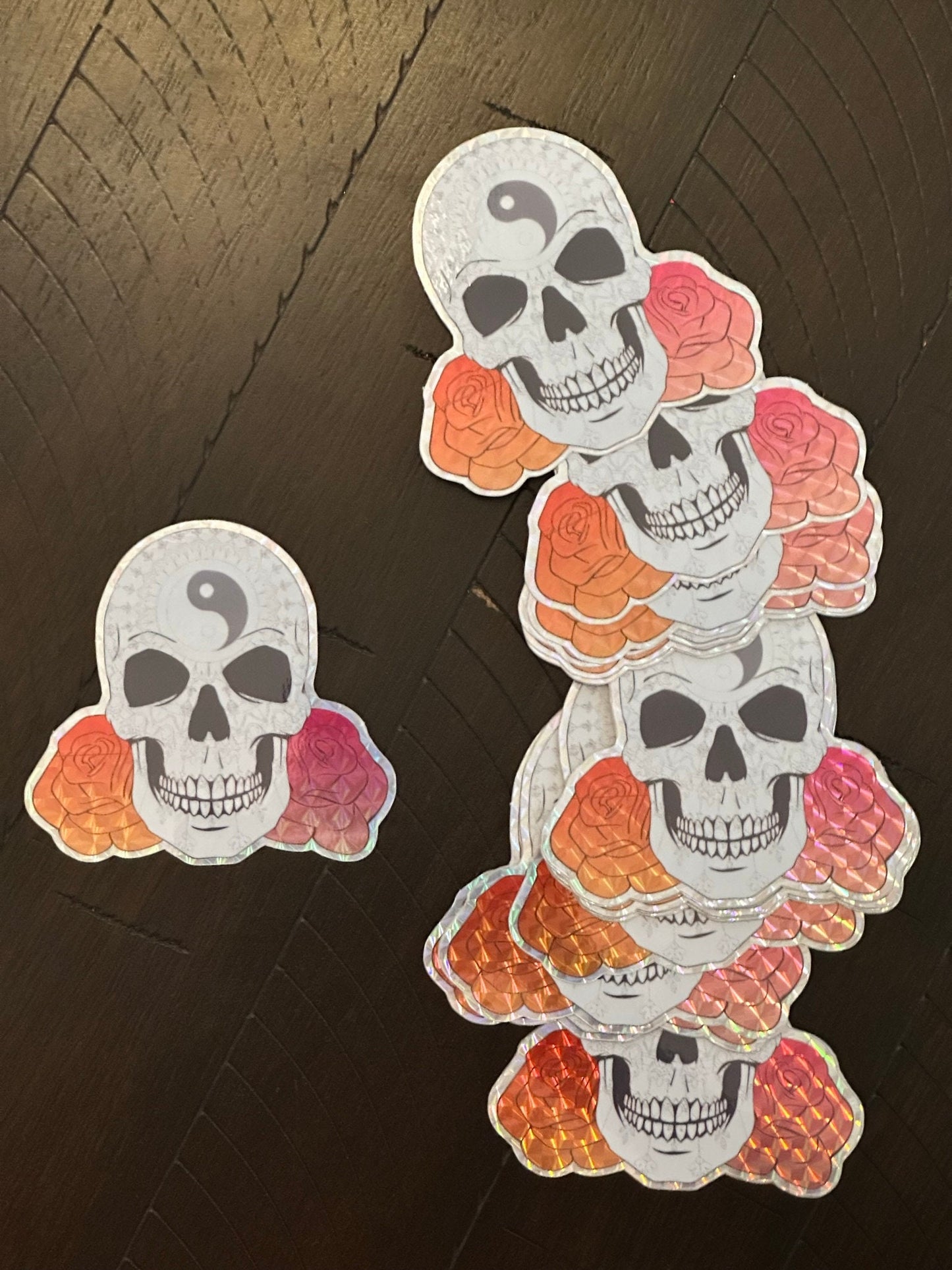 Skull and Roses Mandala sticker -Prismatic paper that’s weather proof - Changing pattern when viewed at different angles - Brightly colored