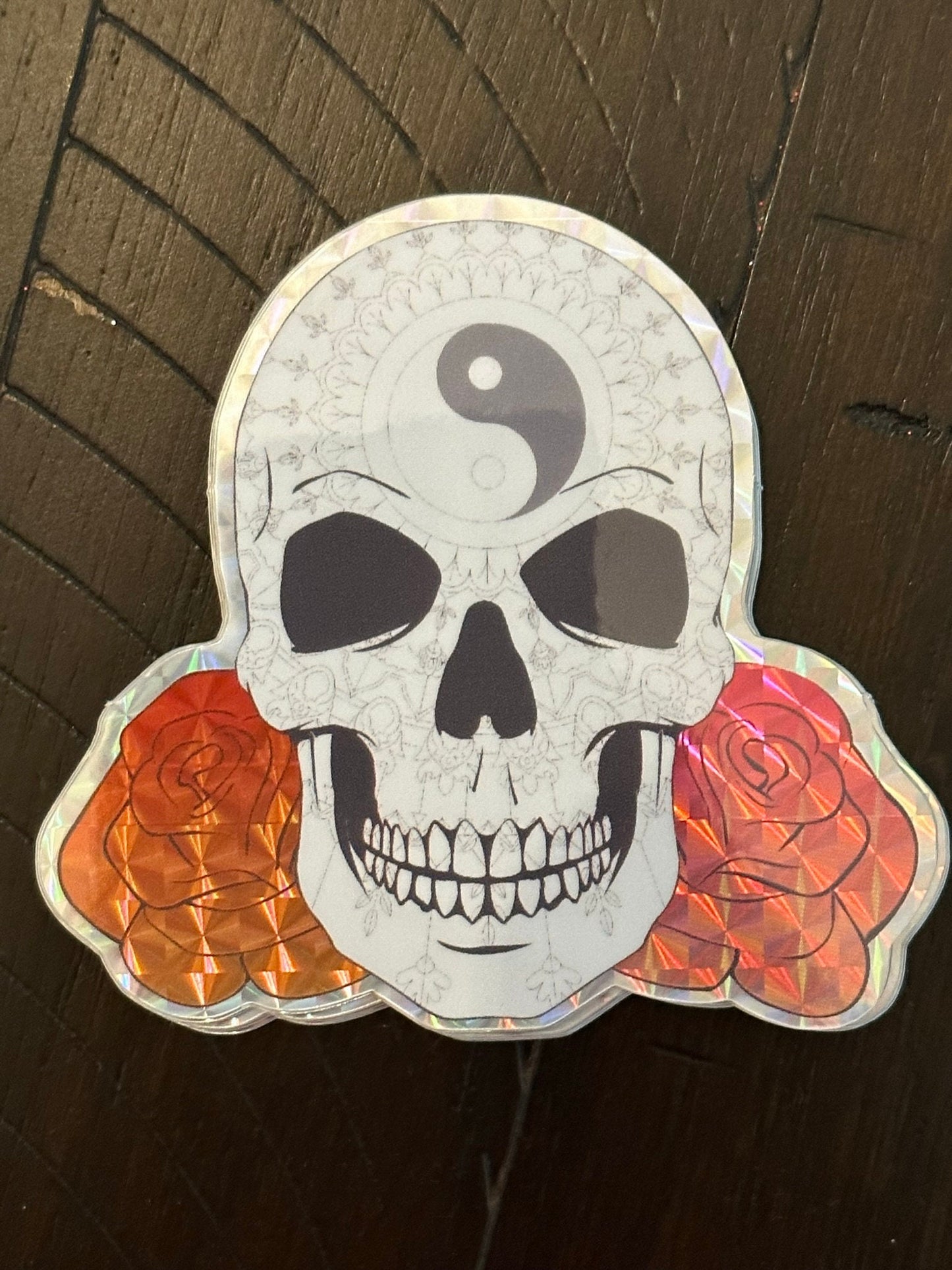Skull and Roses Mandala sticker -Prismatic paper that’s weather proof - Changing pattern when viewed at different angles - Brightly colored