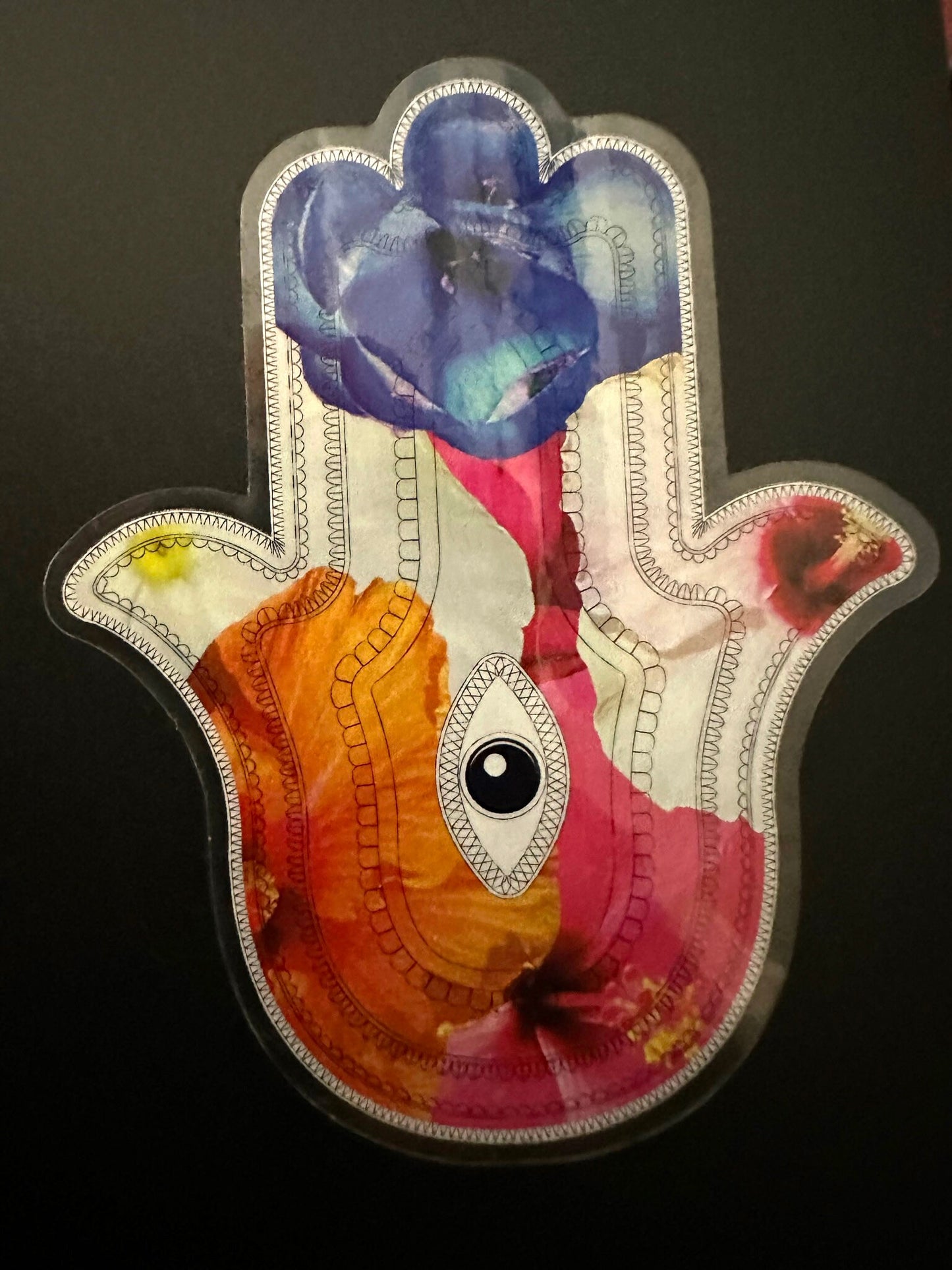Hamsa Sticker - clear sticker with flowers inlaid within the Aztec patterned hieroglyphs with an eye in the center - random floral patterns