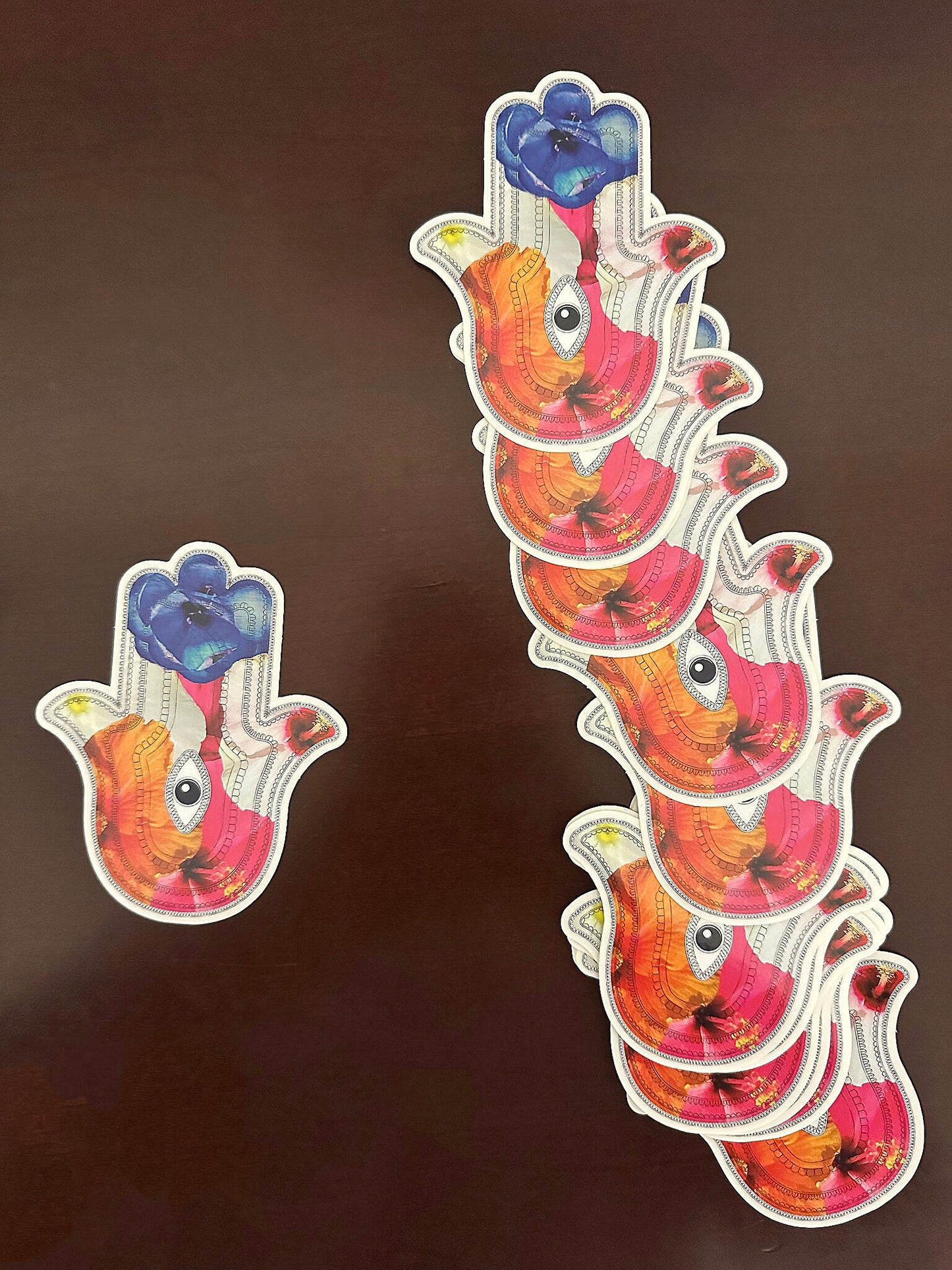 Hamsa Sticker - clear sticker with flowers inlaid within the Aztec patterned hieroglyphs with an eye in the center - random floral patterns