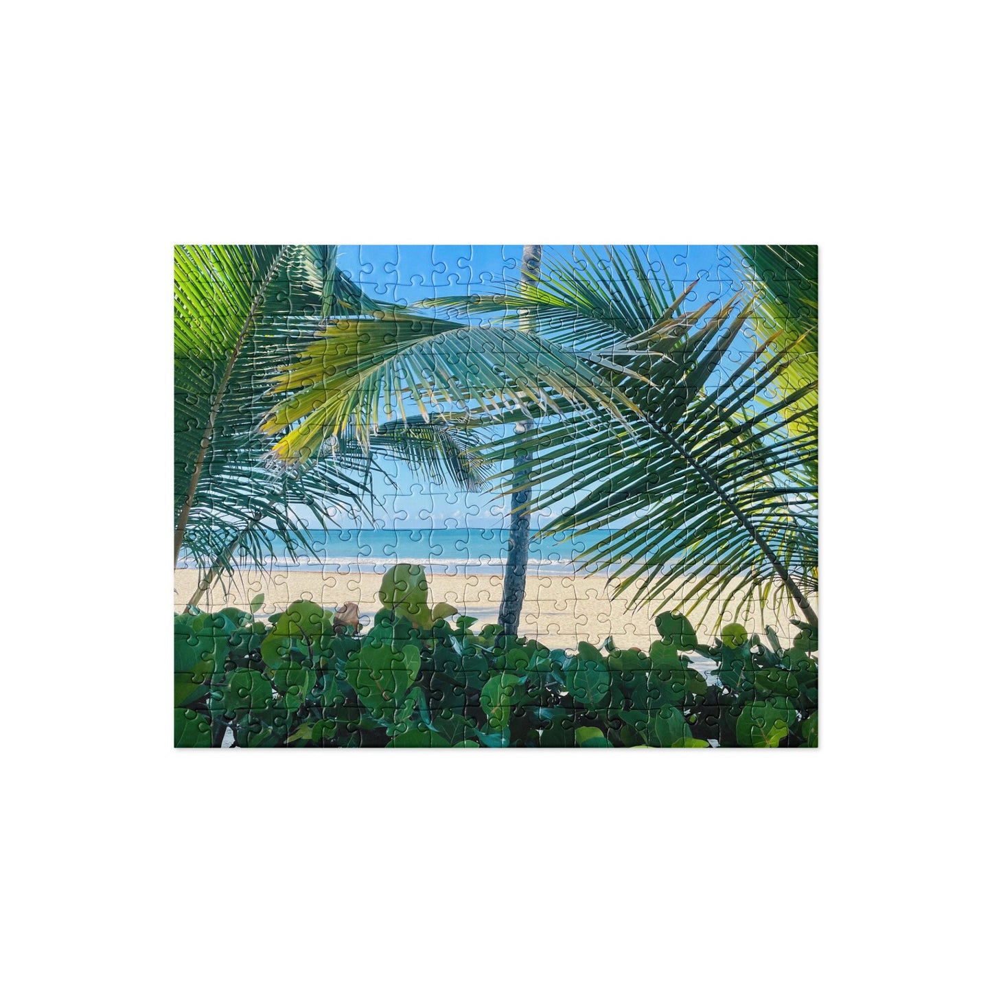 Jigsaw puzzle of Scenic Sandy Beach seen through the Palm Trees of a local shoreline restaurant - available in 2 sizes