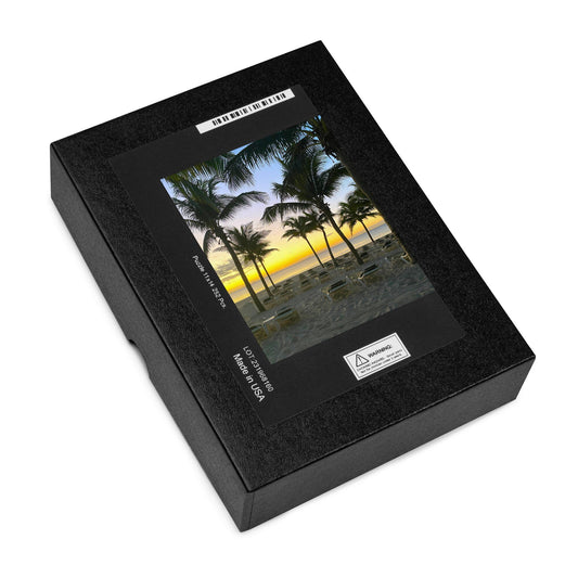 Jigsaw puzzle of the Beach in the sunset on a secluded tropical location - a set of palm trees  with chairs along a stretch of Sandy beaches