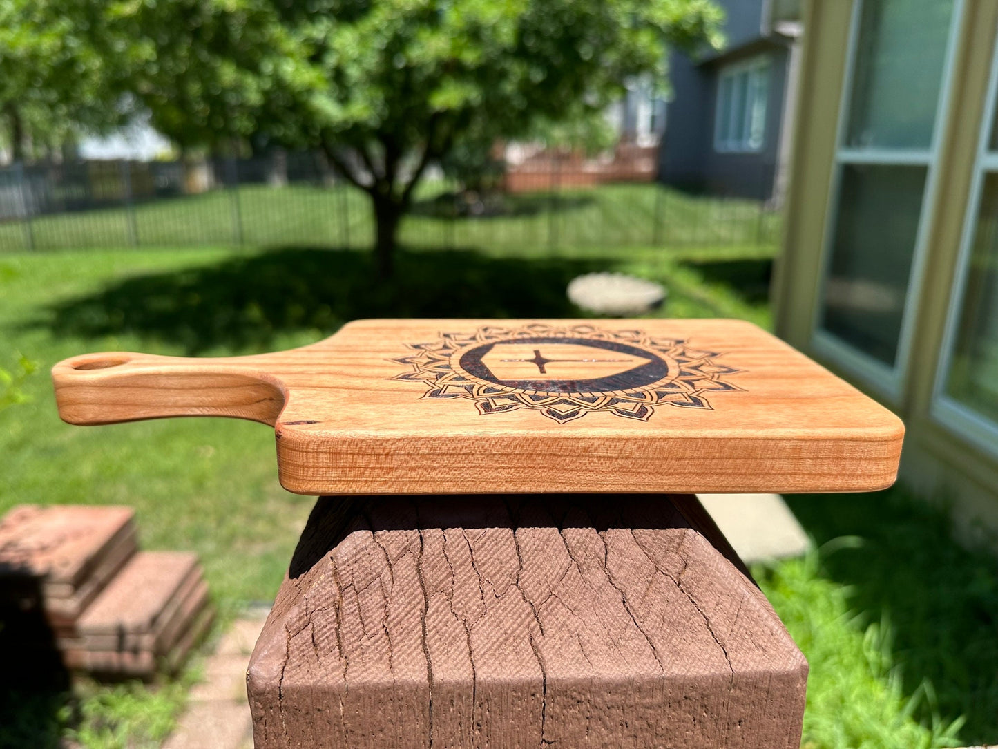 Cutting Board of Wood Burned Mandala with Cross in the center - Pyrographic concentric pattern on Cherry wood slab for charcuterie serving