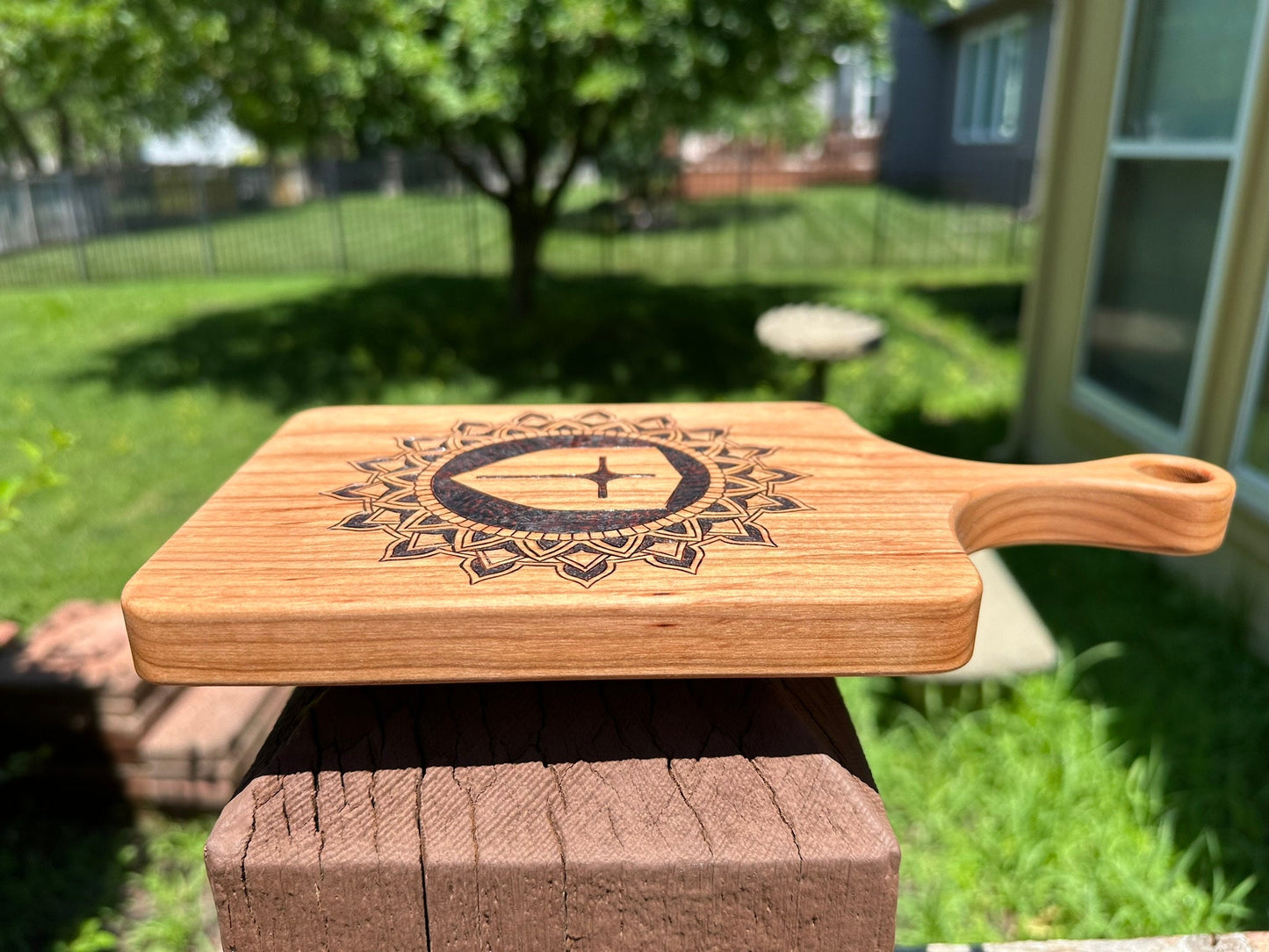 Cutting Board of Wood Burned Mandala with Cross in the center - Pyrographic concentric pattern on Cherry wood slab for charcuterie serving