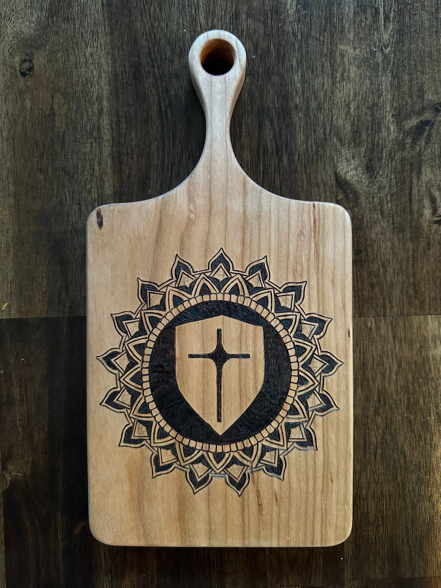 Cutting Board of Wood Burned Mandala with Cross in the center - Pyrographic concentric pattern on Cherry wood slab for charcuterie serving